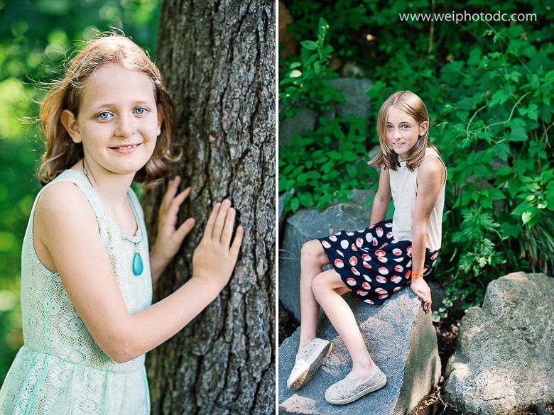 two girls, one is by the tree, another one is sitting on a rock